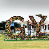 Jonathan Moseley putting the finishing touches to his Great Yorkshire Show Floral display