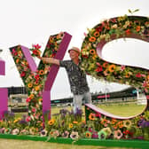 Jonathan Moseley putting the finishing touches to the Great Yorkshire Show floral display