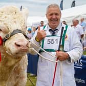 Sea World Olympian and handler Neil Brown were crowned World Congrees Charolais Breed Champion