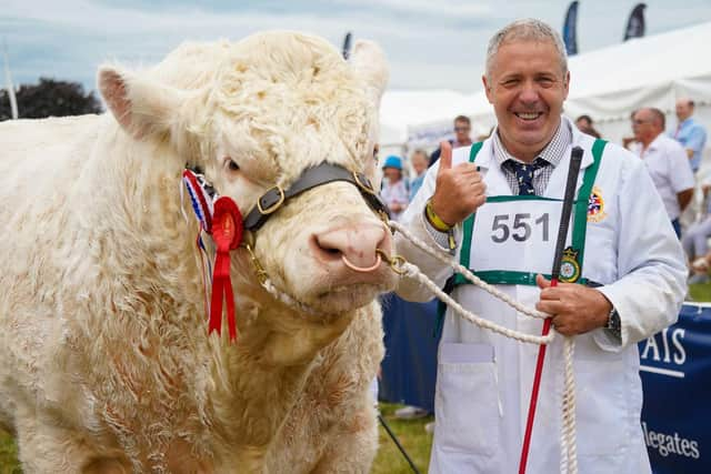 Sea World Olympian and handler Neil Brown were crowned World Congrees Charolais Breed Champion