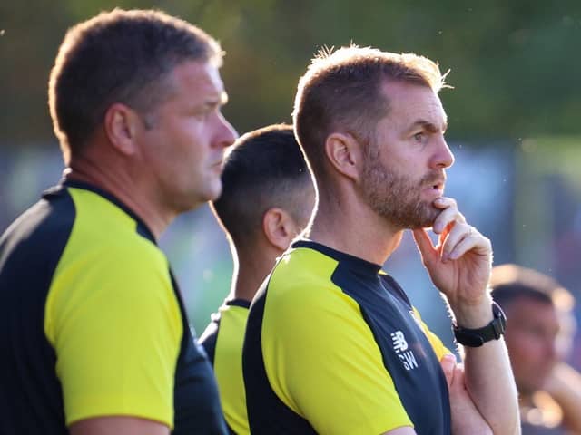 Harrogate Town manager Simon Weaver watches on from his technical area during his side's 3-0 pre-season defeat to Rotherham United. Pictures: Matt Kirkham