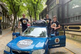 Pausing in Harrogate during 1,500 mile drive - The ‘Kiwis Don’t Fly Rally Team’ is made up of Daniel Patton (22), Joe Fisher (23), and Callum Kitson (22).