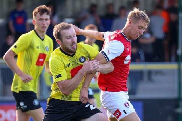 Stephen Dooley battles for possession in midfield during Harrogate Town's 3-0 friendly loss to Rotherham United. Pictures: Matt Kirkham
