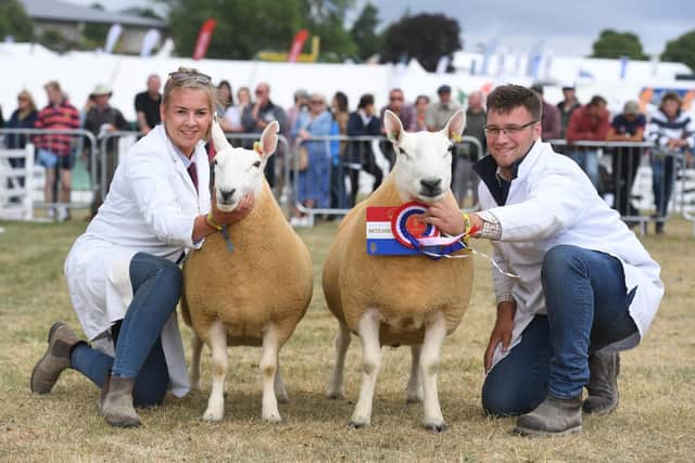 Mary Stones and Jack Brittain with their North Country Cheviot’s owned by Keith Stones of Nuncote Nook Farm who were crowned champions of the Non Accredited Sheep Pairs