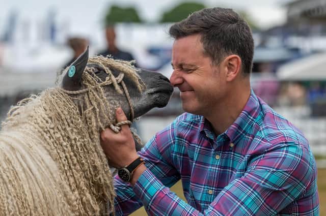 TV Presenter Matt Baker with a Wensleydale Sheep