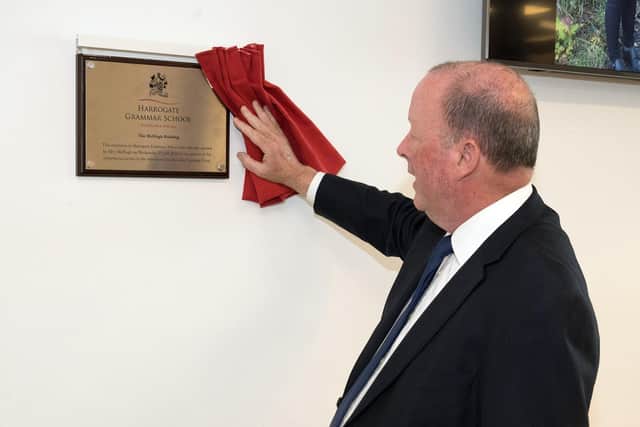 Jim McHugh unveils the plaque at the new McHugh Building at Harrogate Grammar School