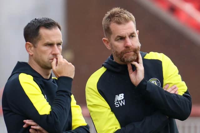 Harrogate Town's management team of Paul Thirlwell, left, and Simon Weaver remain on the look-out for a new striker. Pictures: Matt Kirkham