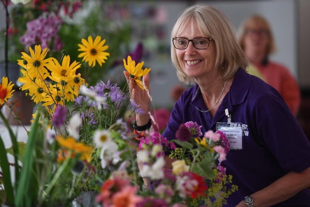 23rd July 2022
Hampsthwaite Feast.
Pictured Helen Brown views the flowers on display in the village hall 
Picture Gerard Binks