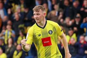 On-loan Huddersfield Town midfielder Matty Daly celebrates after firing Harrogate Town into a 2-0 lead against Swindon Town. Picture: Matt Kirkham