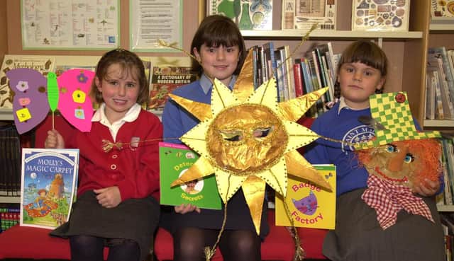 Winners of the Carnival Mask Competition held at Knaresborough Library are from left to right 4 year old Evangeline Bethany Houlgate from Western Primary School, 9 year old Grace Owens, and her 7 year old sister Mae, both from St Mary's Primary School.