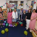 Members of the Harrogate Scrubbers with their quilts on display in the Victoria Shopping Centre