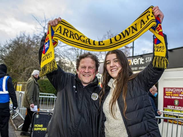 Harrogate Town supporters Dave and Molly Worton outside Wetherby Road.