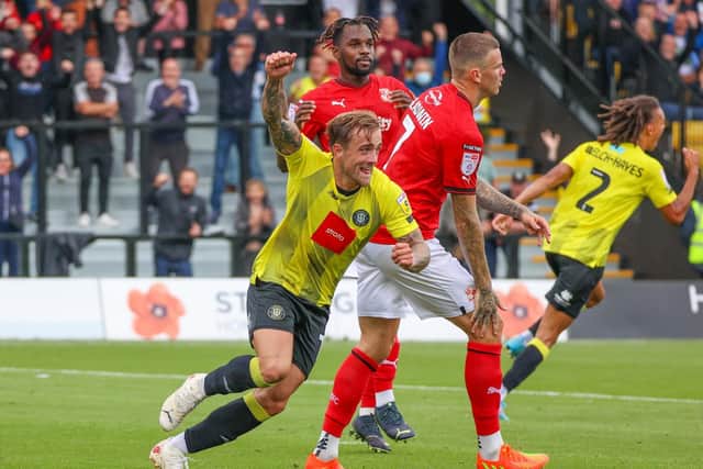 Alex Pattison celebrates after firing Harrogate Town into a 43rd-minute lead against the Robins.