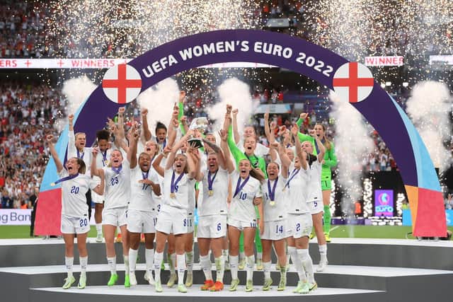 Leah Williamson and Millie Bright lift the UEFA Women’s Euro 2022 trophy
following victory at the competition’s final match between England and
Germany at Wembley Stadium