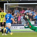 Harrogate Town goalkeeper Pete Jameson is beaten by Connor Jennings' 53rd-minute penalty during Tuesday night's League Cup defeat to Stockport County. Picture: Matt Kirkham
