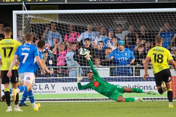Harrogate Town goalkeeper Pete Jameson is beaten by Connor Jennings' 53rd-minute penalty during Tuesday night's League Cup defeat to Stockport County. Picture: Matt Kirkham