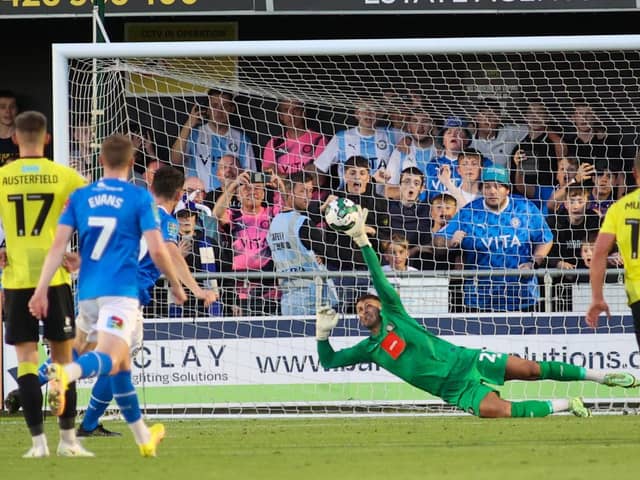 Harrogate Town goalkeeper Pete Jameson is beaten by Connor Jennings' 53rd-minute penalty during Tuesday night's League Cup defeat to Stockport County. Picture: Matt Kirkham