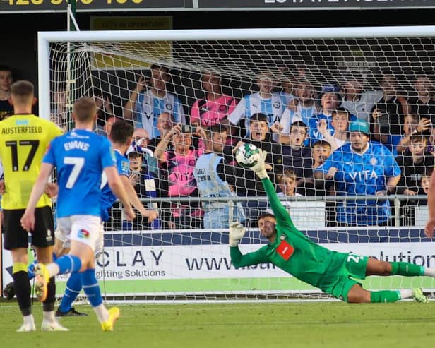 Harrogate Town goalkeeper Pete Jameson is beaten by Connor Jennings' 53rd-minute penalty during Tuesday night's League Cup defeat to Stockport County. Picture: Matt Kirkham