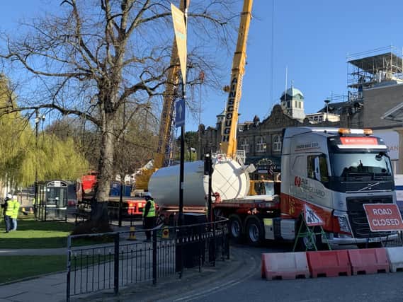Heavy lifting - The giant cranes outside the Royal Hall today as dismantling of the NHS Nightingale hospital in Harrogate is stepped up a gear.