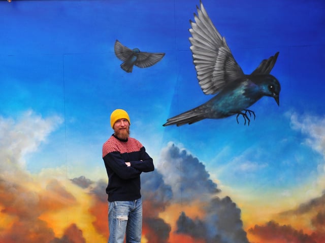Simon Midgley of Starling Independent Bar Cafe Kitchen in Harrogate with the new mural by artist Sam Porter in the bar's new outside dinning/drinking area which will be ready to open on April 12. (Picture Gerard Binks)