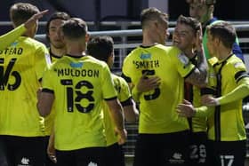 Harrogate Town celebrate after Josh McPake netted their second goal against Leyton Orient. Pictures: Matt Kirkham