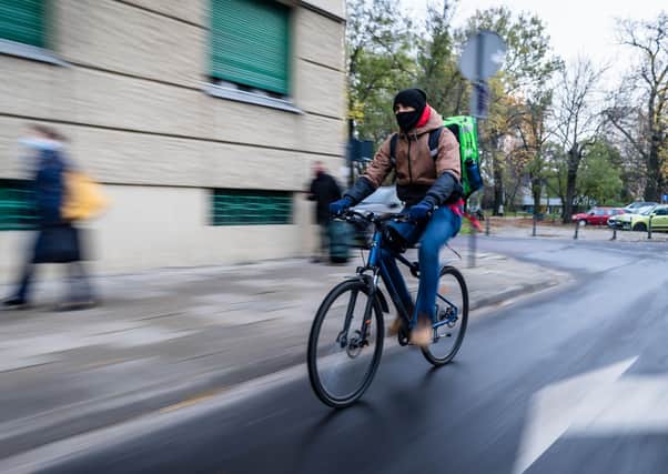 Carers and bike couriers are among the roles that Green New Deal UK says should be regarded as “green”. Pic: WOJTEK RADWANSKI/AFP via Getty Images