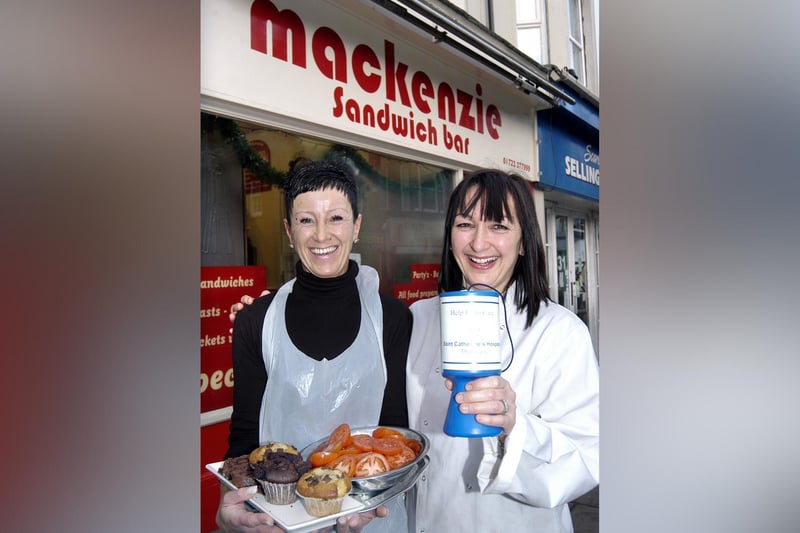 Owner of Mackenzie’s Ann-Marie McNeilly and Sharon Emanuel with a hospice collecting tin.