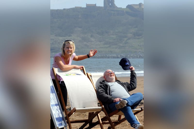 Promoting new deck chairs on North Bay, Rachel Dean is pictured with customer Ian Wylie.