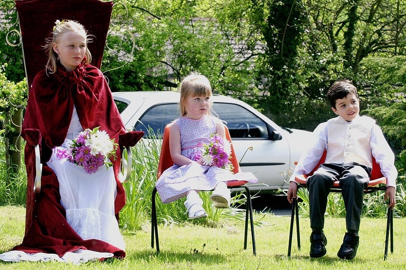 2004: May Queen Maria Stott (left) waits to be crowned at Glasshouses May Day Gala.