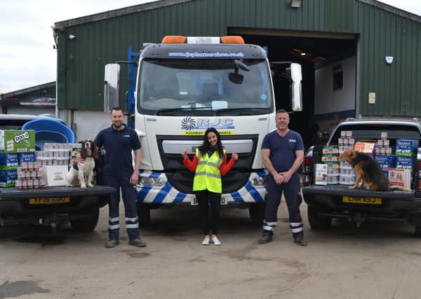 John Harrison, Zena Jackson and Chris Jackson of Tadcaster-based grab hire company RJC Plant Services, which has donated 1,000 meals to local dog charities, including Miss Mollies Pet Rescue in Harrogate.