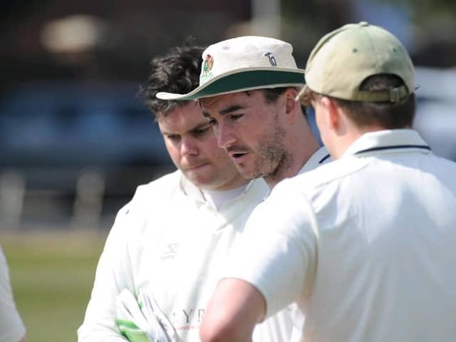 Harrogate CC captain Will Bates addresses his players during Saturday's home defeat to Castleford.