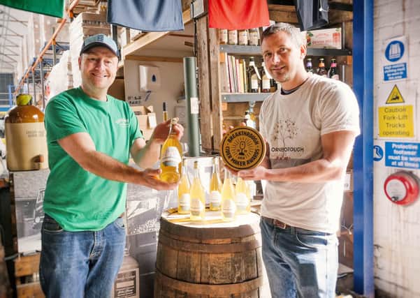 Kingsley Ash (right) of Thornborough Cider near West Tanfield received the very first Breakthrough Cider Maker Award from Barny Butterfield, chief cidermaker at Devon-based Sandford Orchards.