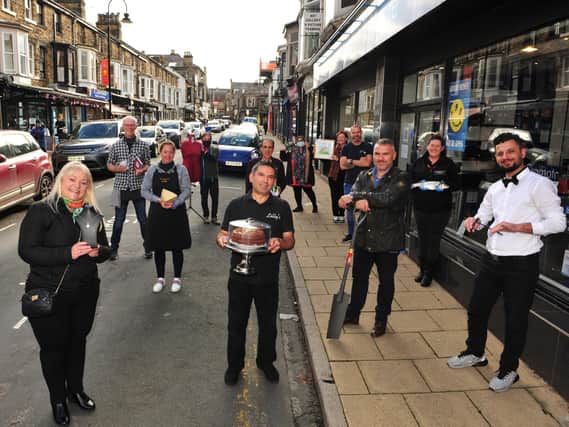 Some of the shop owners on Commercial Street in Harrogate.