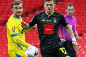 Lloyd Kerry keeps his eye on the ball during Harrogate Town's 1-0 win over Concord Rangers at Wembley. Pictures: Matt Kirkham