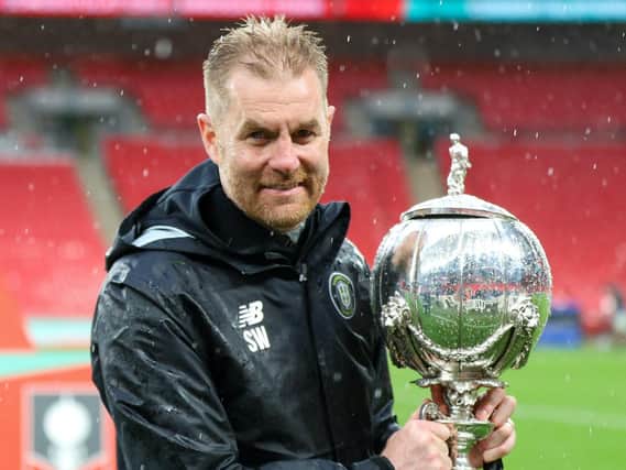 Harrogate Town manager Simon Weaver with the FA Trophy following his side's 1-0 win over Concord Rangers at Wembley Stadium. Picture: Matt Kirkham