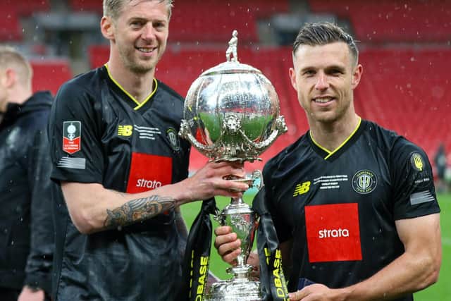 Strike duo Jon Stead, left, and Jack Muldoon with the FA Trophy.