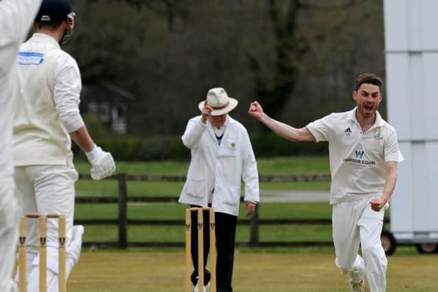 Henry Saul celebrates after taking a wicket for Goldsborough.