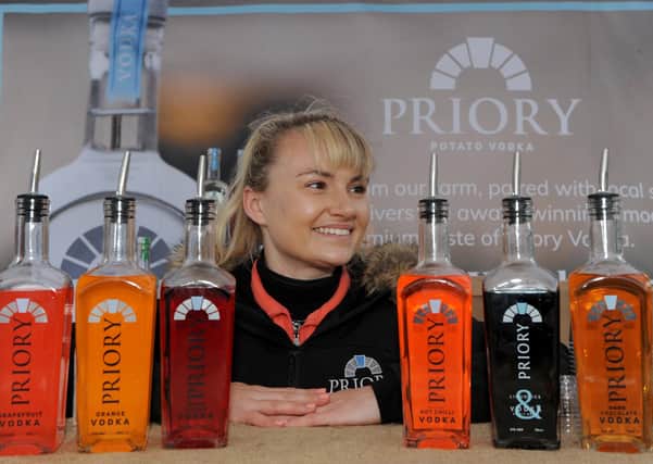 Artisan market stall holder Charlotte Wood of Priory Potato Vodka. Picture Gerard Binks