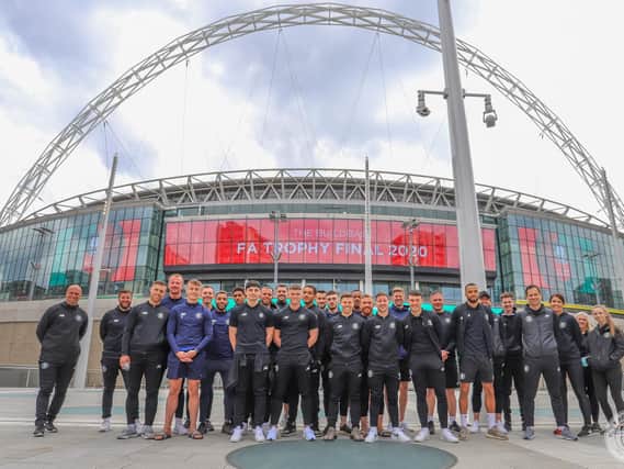 Harrogate Town players at Wembley Stadium, the scene of their FA Trophy triumph.