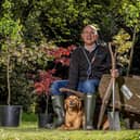 Dalton-based Inspired Pet Nutrition (IPN) has committed to planting one million trees across the UK. Pictured: CEO James Lawson and his dog Barney planting trees at Thorp Perrow Arboretum. PHOTO: Charlotte Graham.