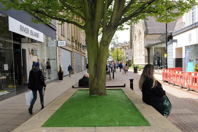 Harrogate Borough Council is set to remove the artificial grass from plant pots in the town centre. Picture: Gerard Binks.