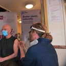 10th April 2021
Pateley Bridge Covid-19 Vaccination Centre.
Pictured Paul Keen from Harrogate gets his jab on the opening day for the Vacination centre at Pateley Bridge at the Memorial Hall.
Picture Gerard Binks
