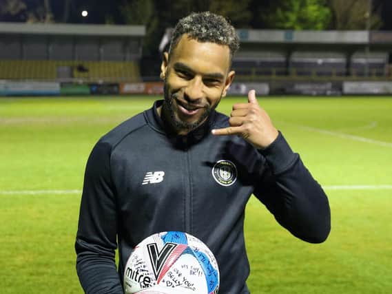 Brendan Kiernan with the match ball signed by his Harrogate Town team-mates following his hat-trick against Cambridge United. Pictures: Matt Kirkham