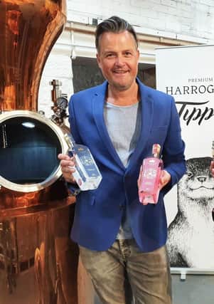 Steven Green, managing director of distillery Harrogate Tipple, with the Downton Abbey branded spirits the company is exporting to China.