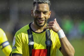 Brendan Kiernan celebrated each goal of his recent League Two hat-trick against Cambridge United by making his trademark 'call me' gesture. Pictures: Matt KIrkham