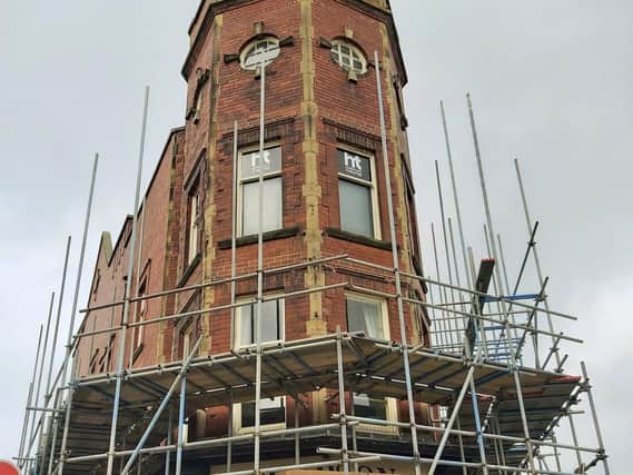 A huge temporary structure is being erected over Harrogate Theatre ready for the roof to be stripped back next month.
