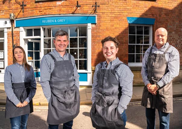 Cathy Meddows-Taylor, co-founders Craig Buchan and Luke Morland, and Mark Johnson outside Reuben & Grey, the fine wine shop they have opened in Knaresborough. PHOTO: Simon Dewhurst.