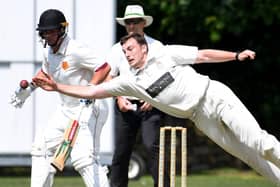 Beckwithshaw CC's Oliver Hotchkiss attempts to take a catch off his own bowling during Saturday's defeat to local rivals Bilton. Pictures: Gerard Binks