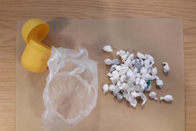 Seized Kinder egg with suspected drug wraps inside.