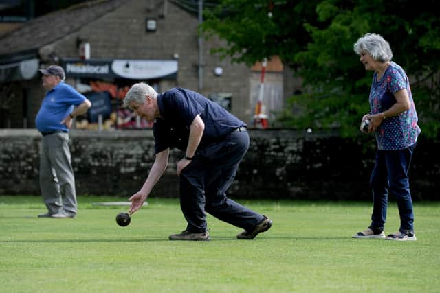 Pateley Bridge Bowling Club. Pictured Chris Ellwood and Mable Parker playing a game on the Green at Pateley Bridge. Picture Gerard Binks